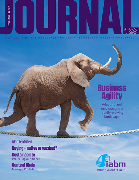 The cover image for the Q3 2023 IABM Journal showing an elephant walking on a tightrope