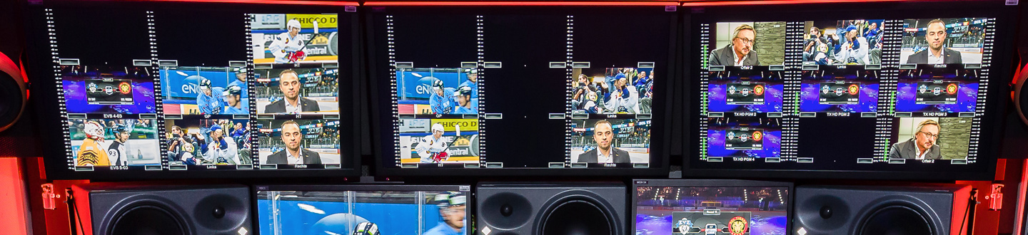 Mutliviewer monitors showing a live hockey game