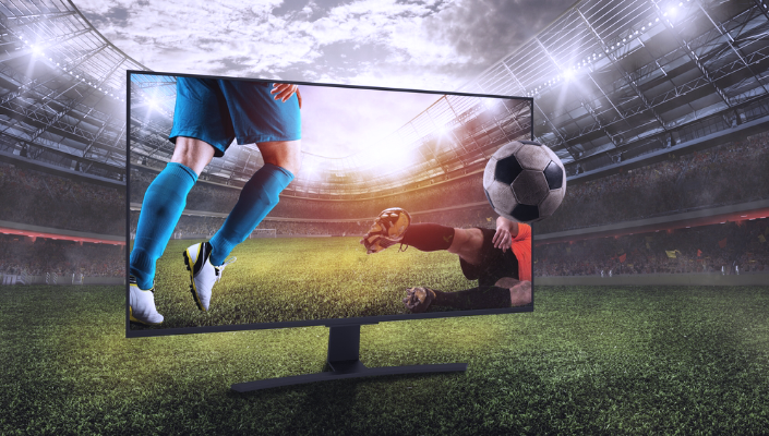 soccer players on a tv